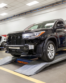Toyota on vehicle lift | Stone Mountain Toyota in Lilburn GA